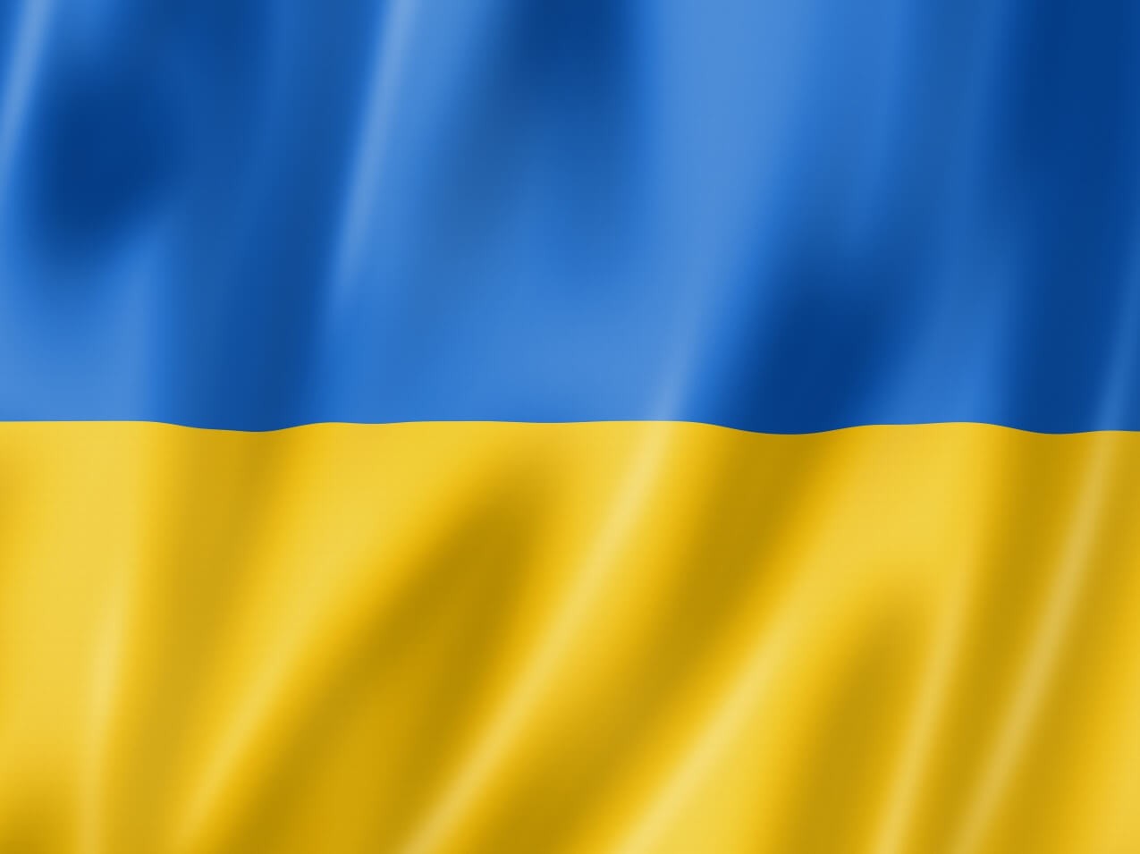 Fahne Ukraine im Wind wehend